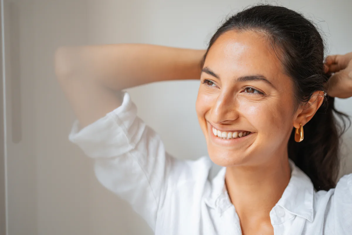 Woman smiling in natural light