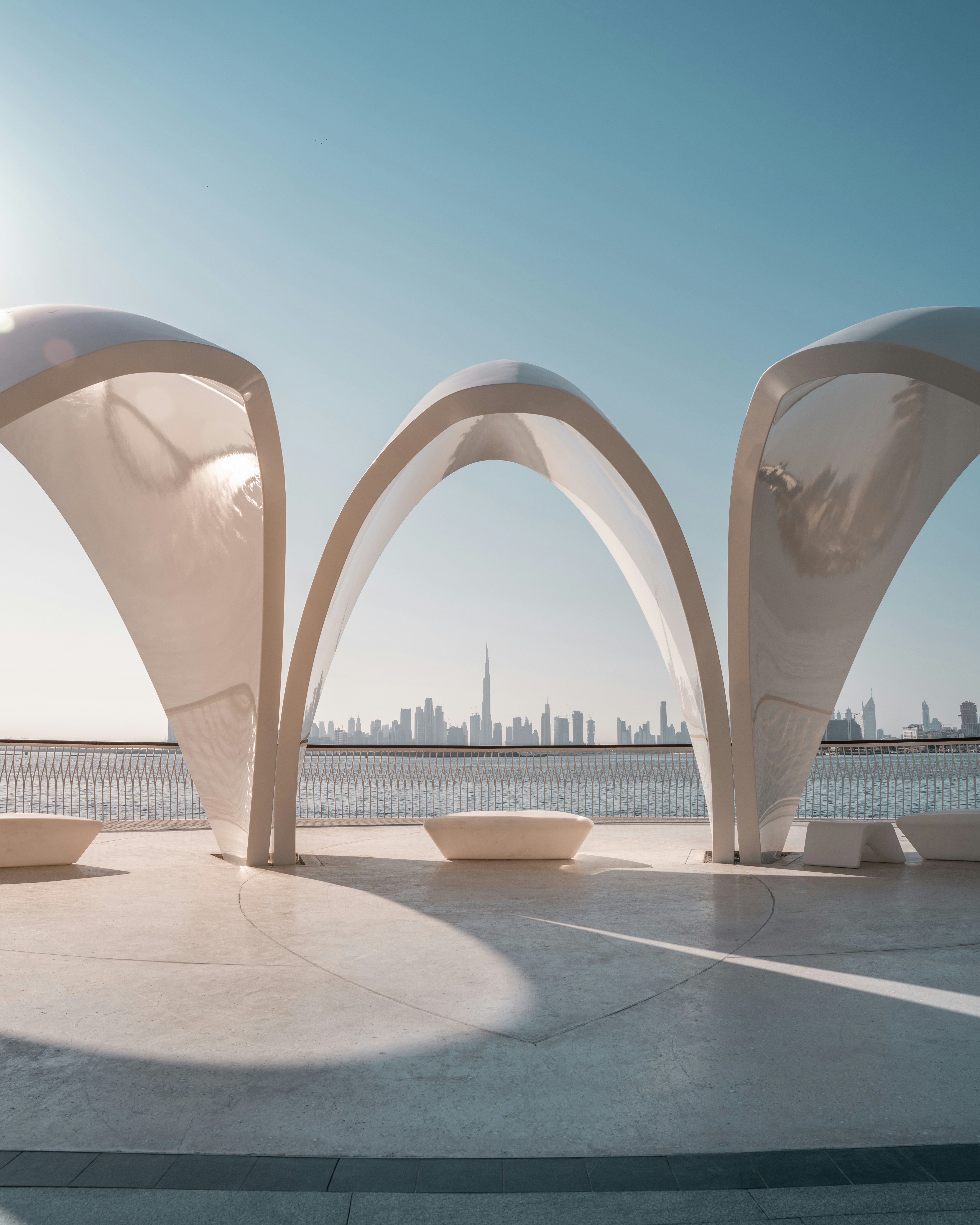 Dubai skyline through architectural arch